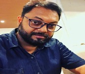 Dr. Parthasarathi De